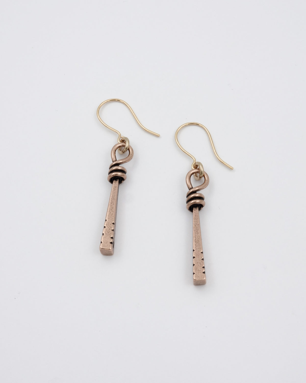 Kept Pahanpiiskat earrings bronze
