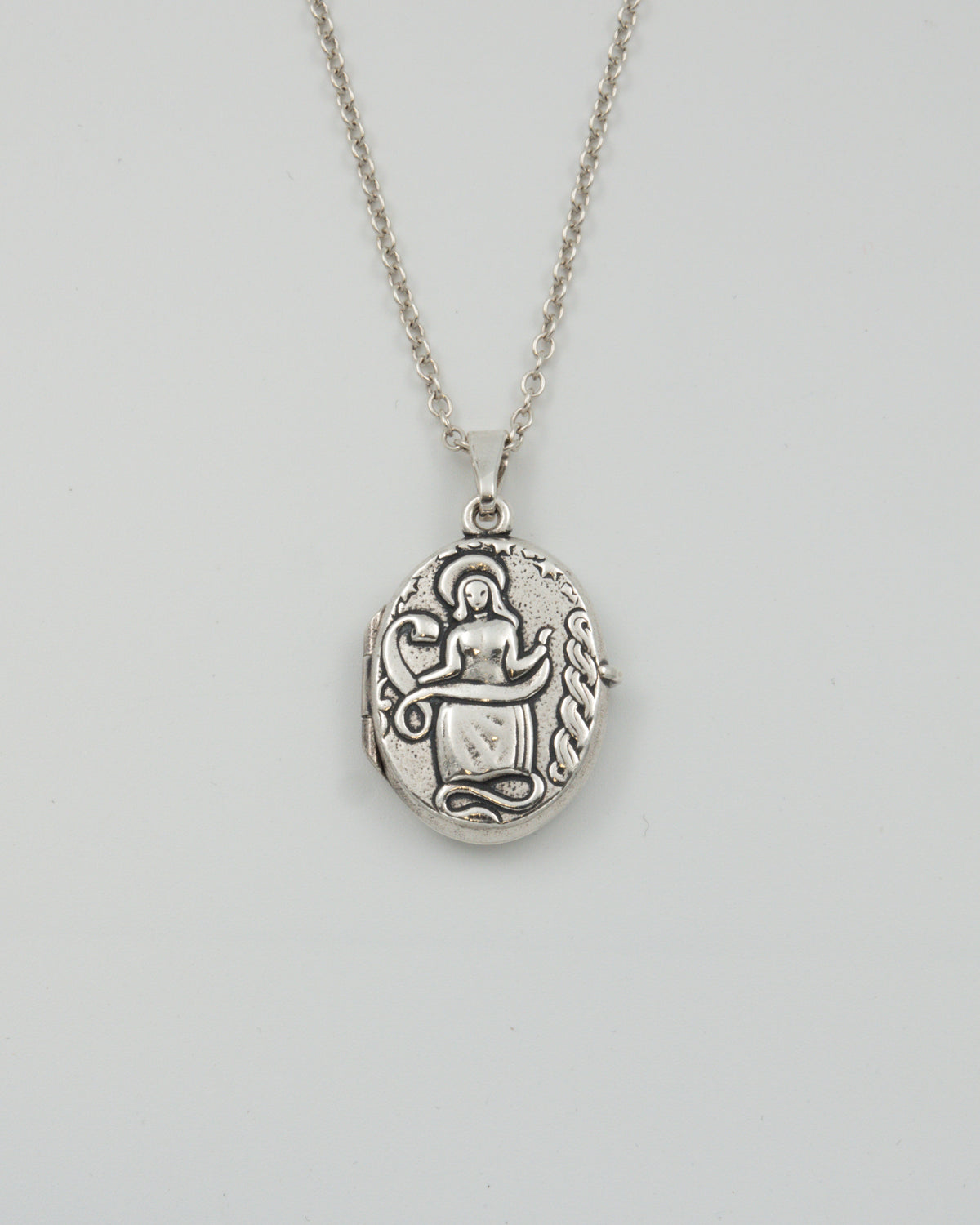 Pidetty Madonna-medaljonki 70 cm hopea