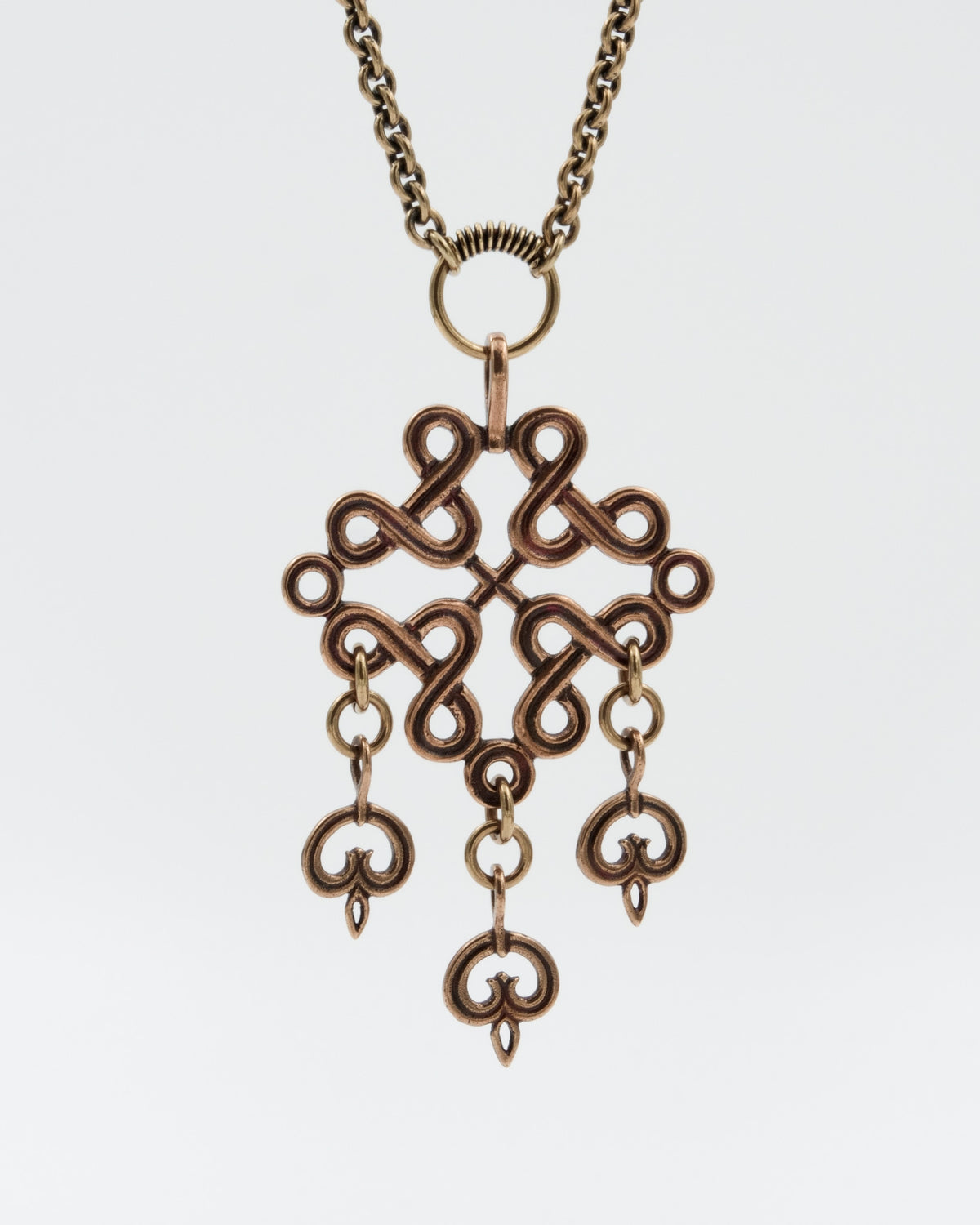 Preloved Karelian plaited ribbon motif  pendant 70 cm bronze